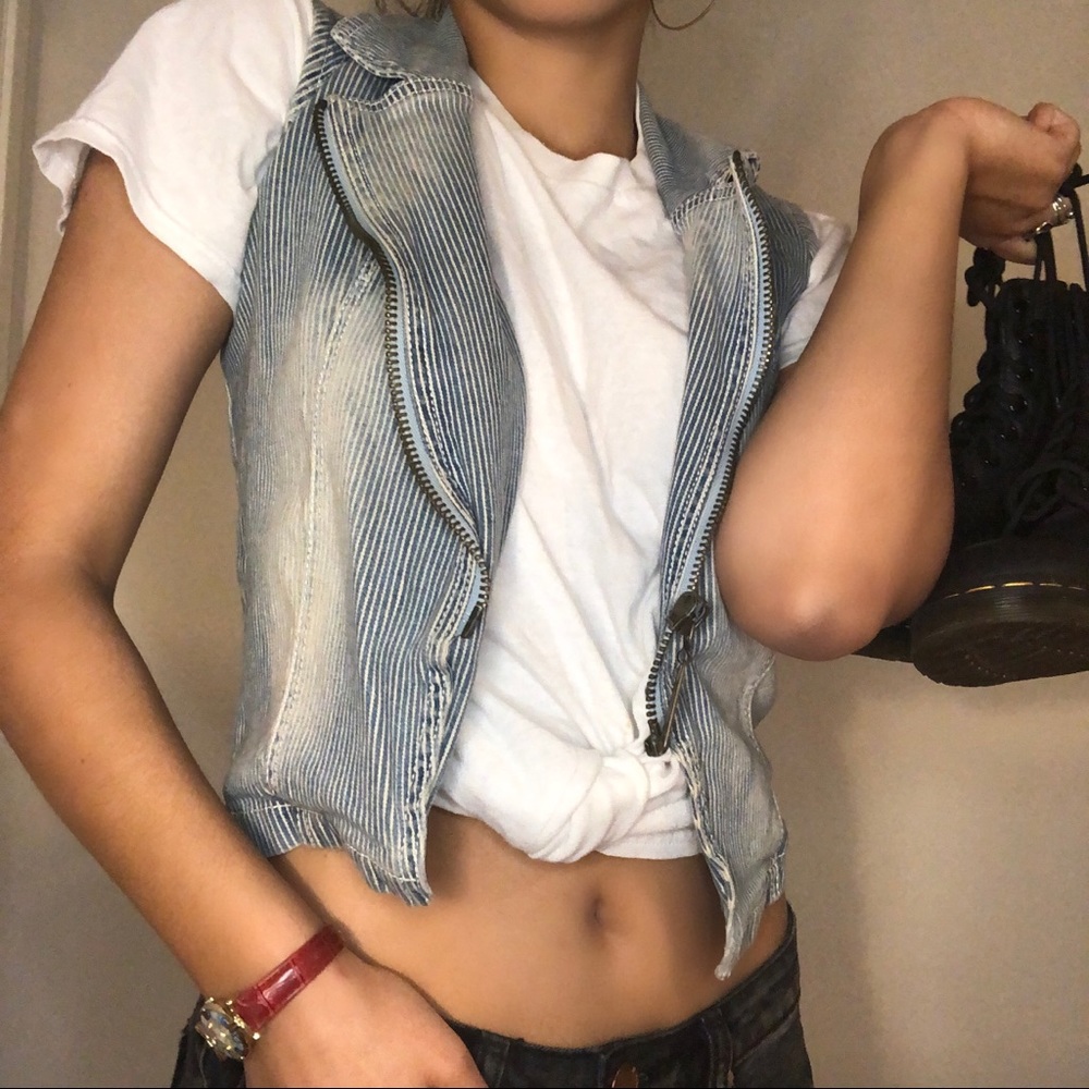 Faded denim vest with vertical stripes